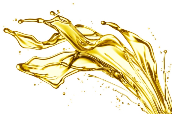 Splash of gold colored liquid depicting fuel oil composition