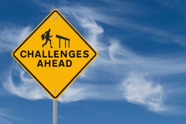 challenges ahead road sign depicting iaq