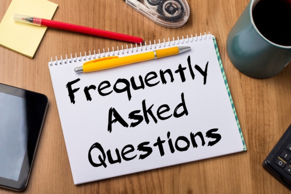 frequently asked questions written on a notepad depicting FAQs about Hydronic Oil Heating Radiator